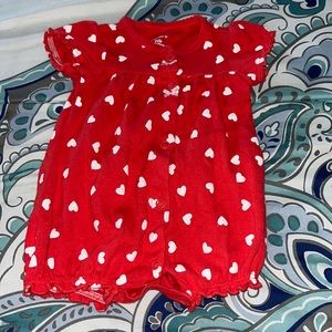 This onesies is from carters the material is 100% cotton and in good condition.